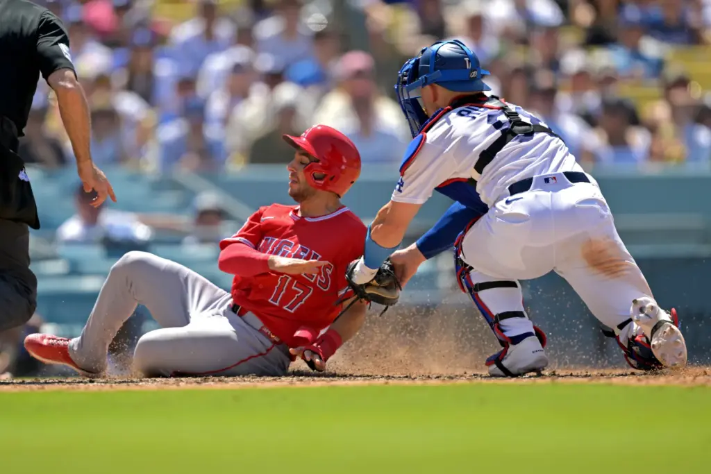 Angels’ Nick Madrigal, second from right, is tagged out at...