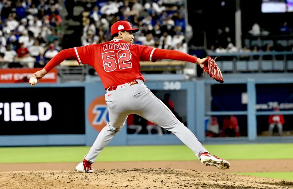 Relief pitcher Samuel Natera Jr. #52 of the Angels makes...
