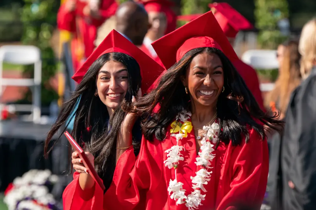 Armita Jafa, left, and Aahva Shah are all smiles after...