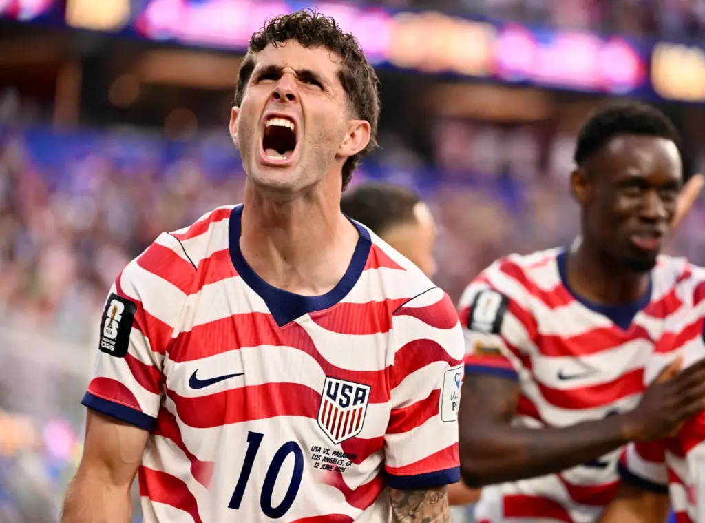 United States midfielder Christian Pulisic (10) celebrates after a goal...