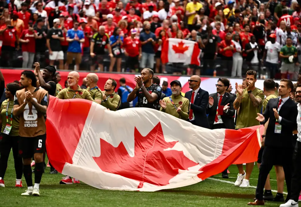 Canada celebratdls with the fans after defeating South Africa 1-0...