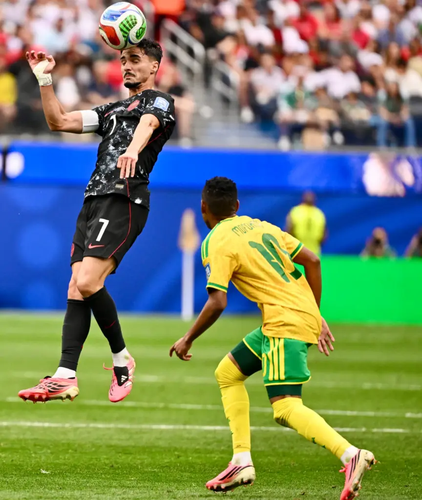 Canada midfielder Stephen Eustaquio (7) with the header over South...