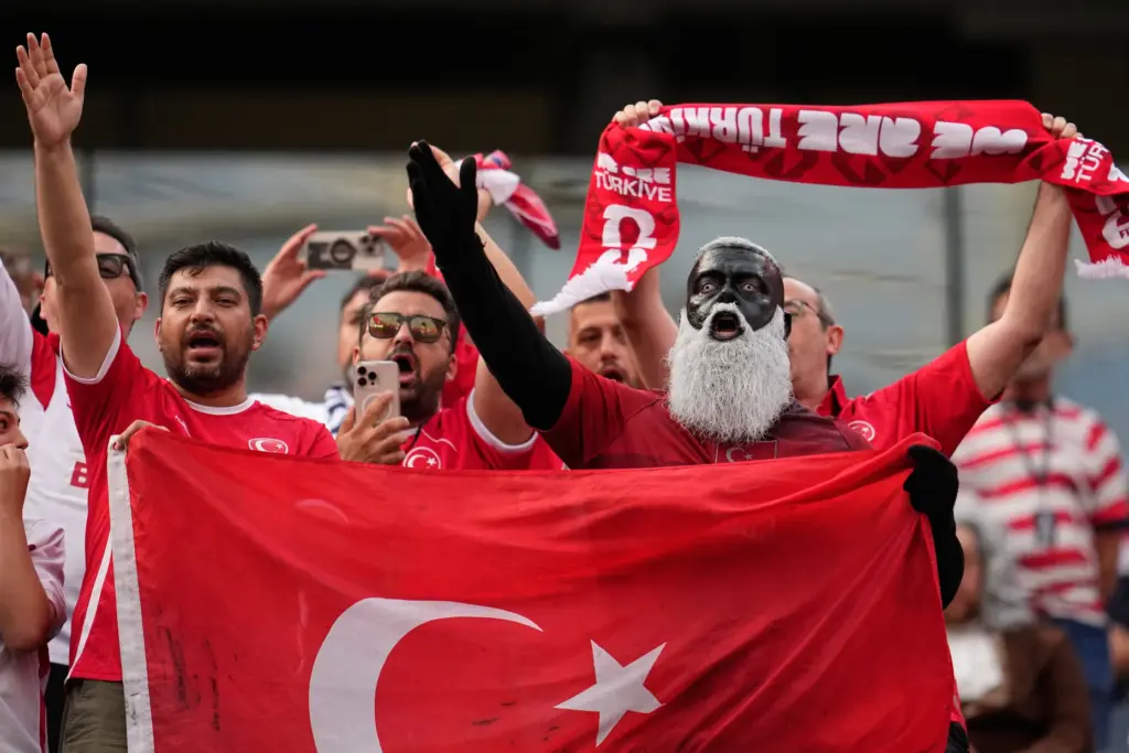Turkey fans react ahead of the World Cup Group D...