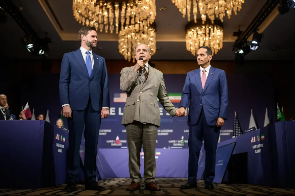 Pakistan’s Prime Minister Shehbaz Sharif, center, speaks between US Vice...