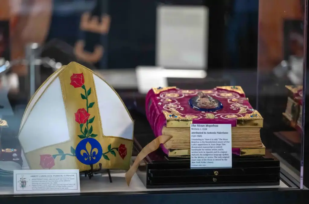 A collection of historical relics and documents sits on display...