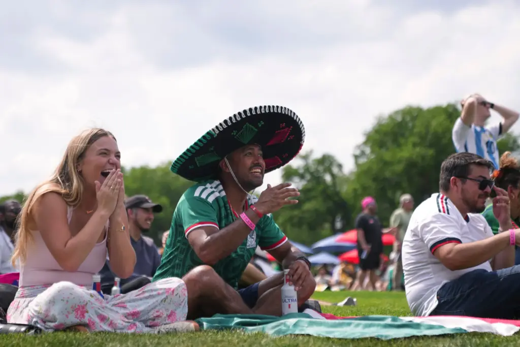 Fans gather to watch the first match of the World...