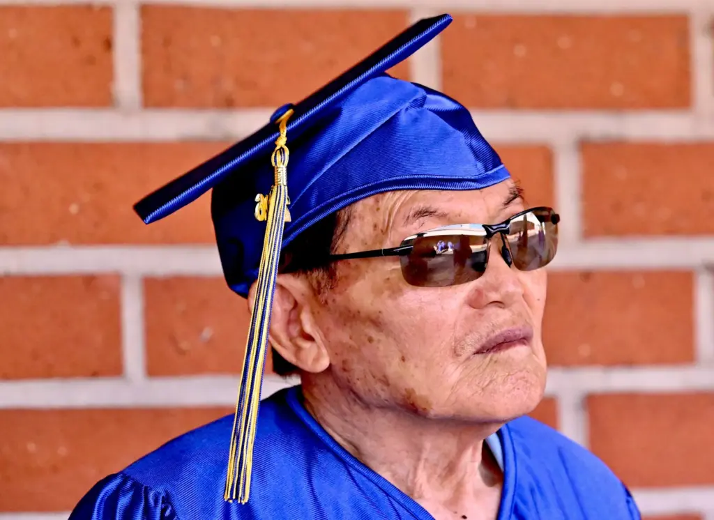 Soo Hak Kwon, 91, prepares for his graduation. Kwon immigrated...