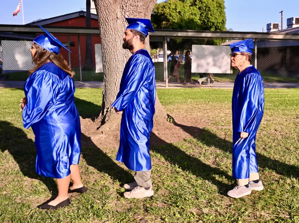Soo Hak Kwon, 91, walks to receive his diploma. Kwon...