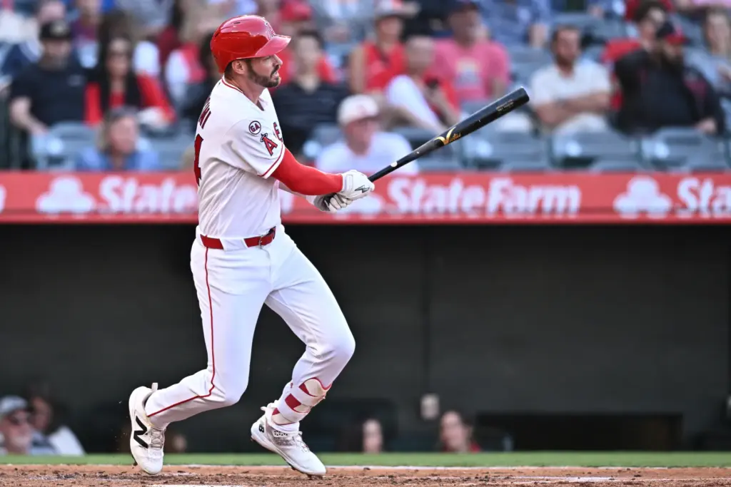 The Angels’ Trey Mancini watches his RBI single during the...
