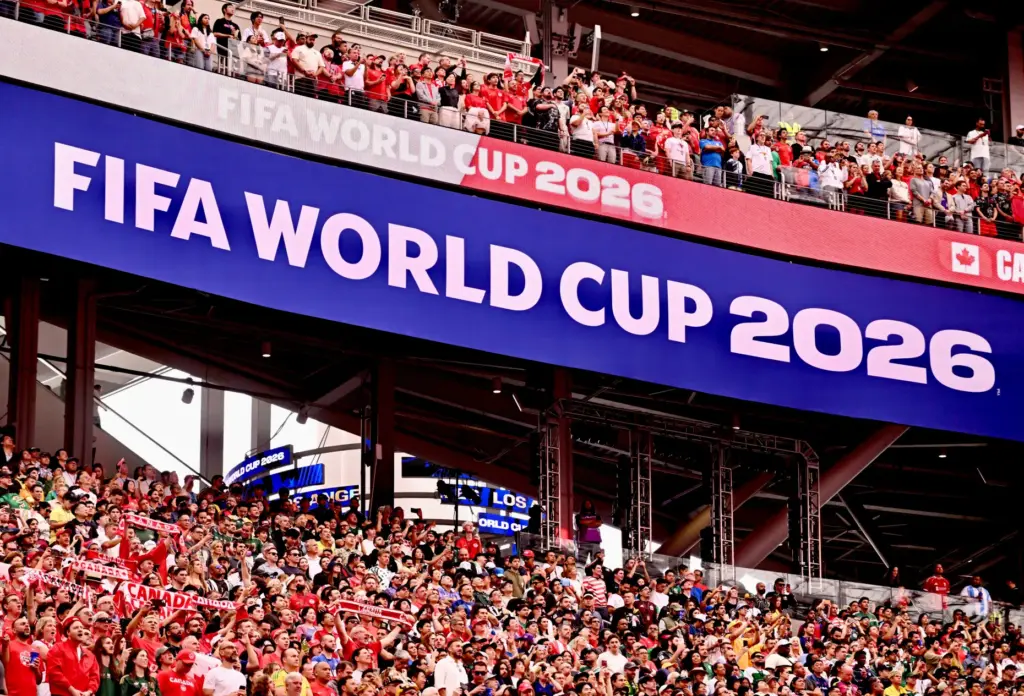 Canadian and South African fans cheer prior to a FIFA...