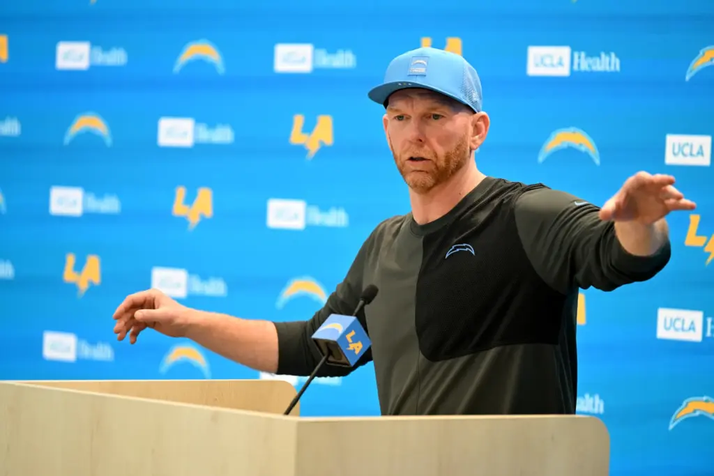 New Chargers offensive line coach Butch Barry speaks to the...