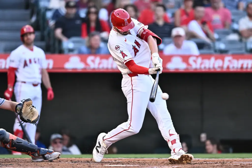 The Angels’ Trey Mancini hits an RBI single during the...
