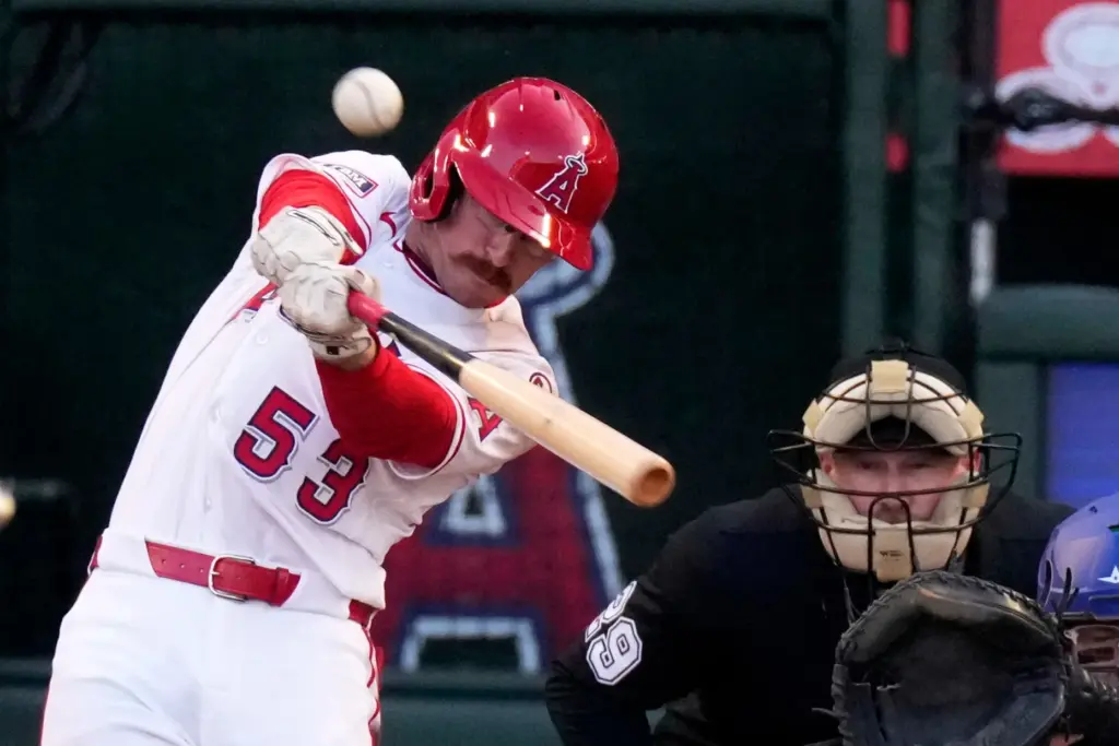 The Angels’ Wade Meckler hits a three-run homer during the...