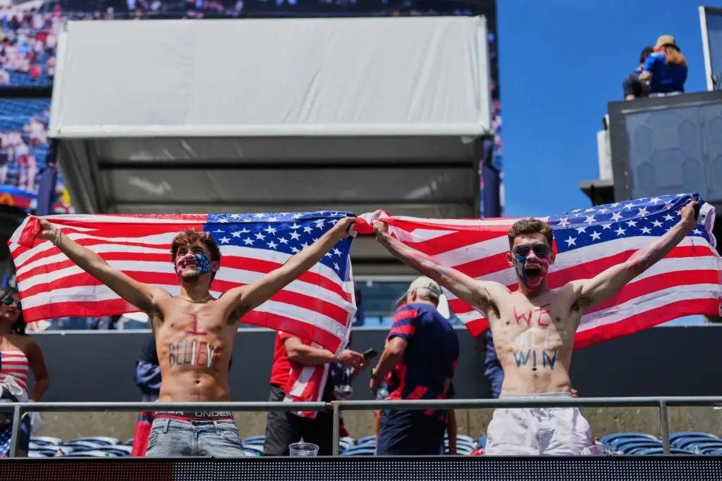 United States fans celebrate after the World Cup Group D...
