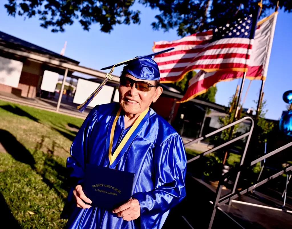 Soo Hak Kwon, 91, recieves his diploma. Kwon immigrated from...