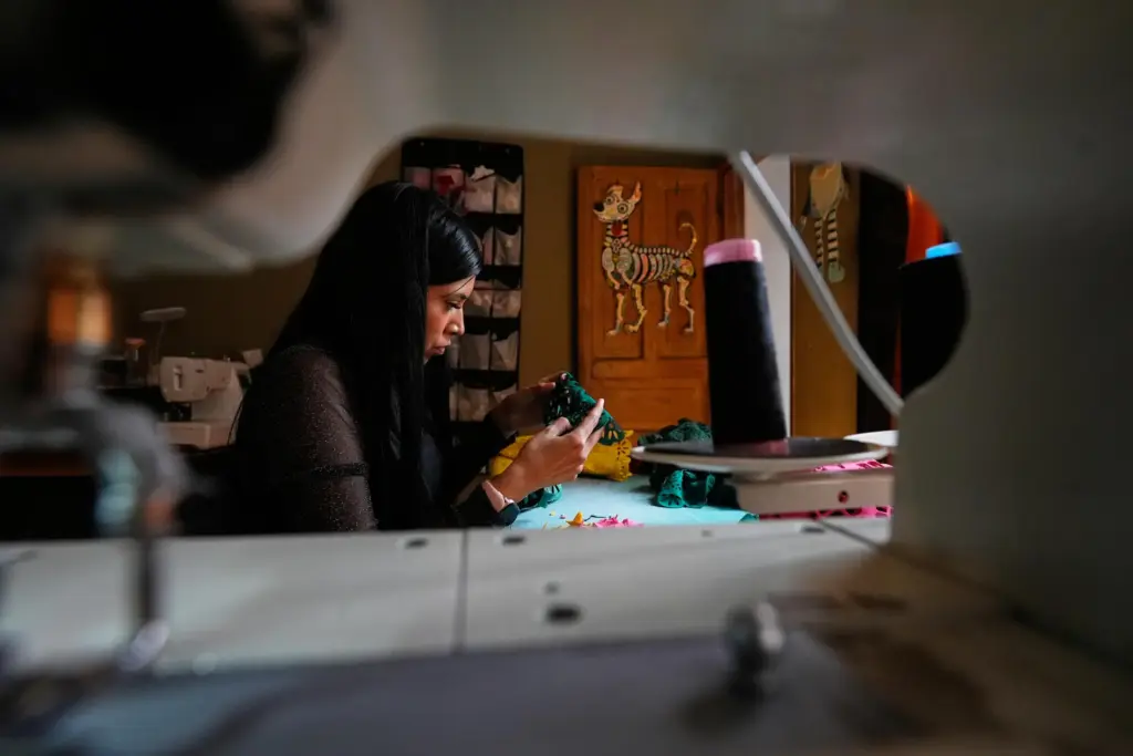 Cande Martinez prepares soccer jerseys, inspired by papel picado and...