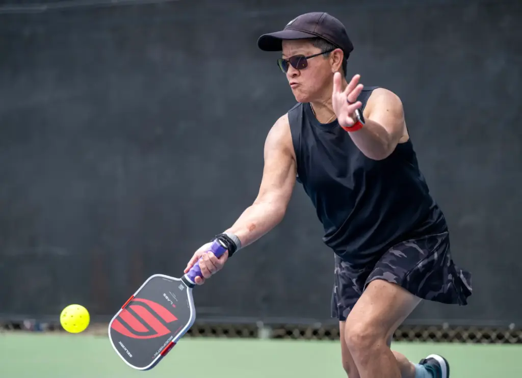 Michelle Darrow of Laguna Niguel hits an underhand shot while...