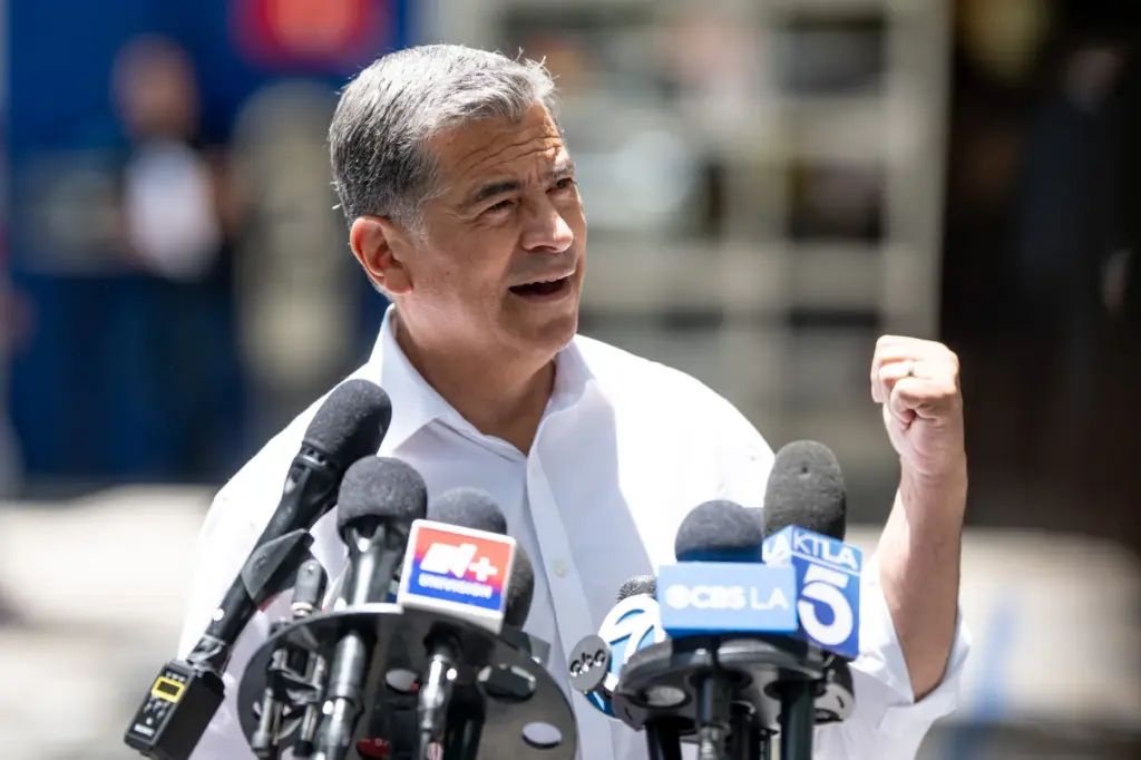 Democratic gubernatorial candidate Xavier Becerra talks with media after meeting...
