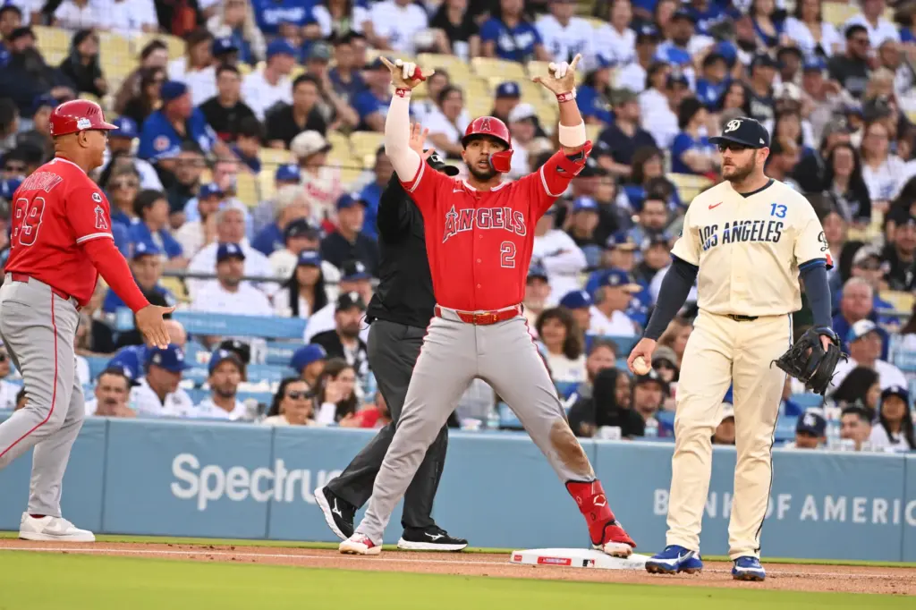 Oswald Peraza #2 of the Angels reacts after a RBI...