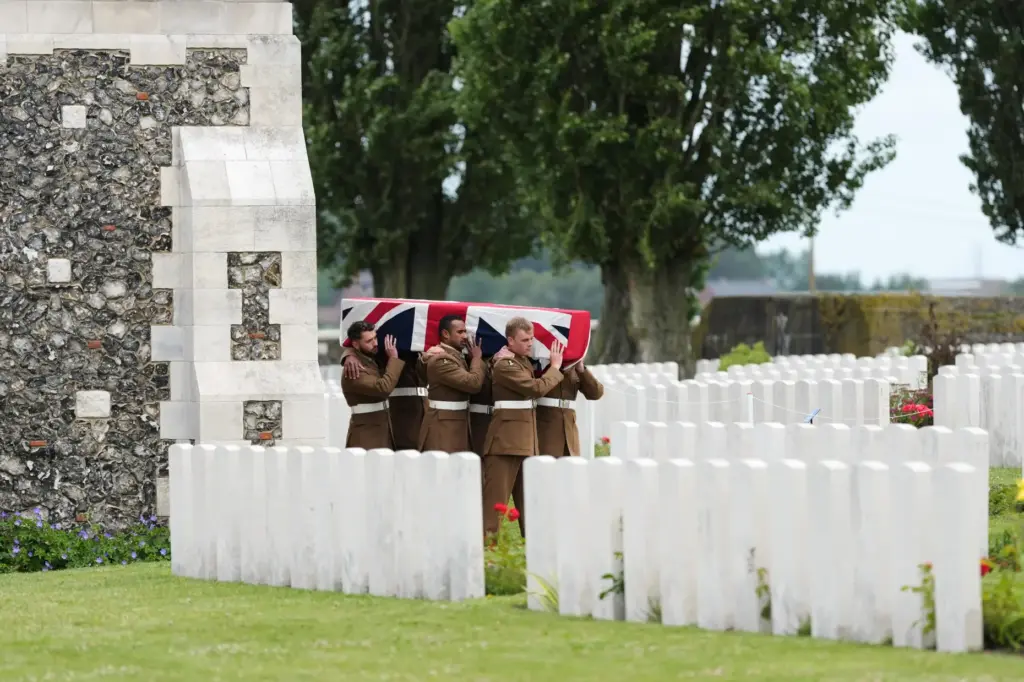 Soldiers from the Princess of Wales’s Royal Regiment carry a...