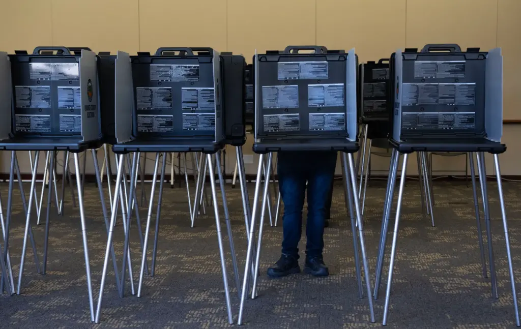 Although some poll workers said they expect a heavy turn...