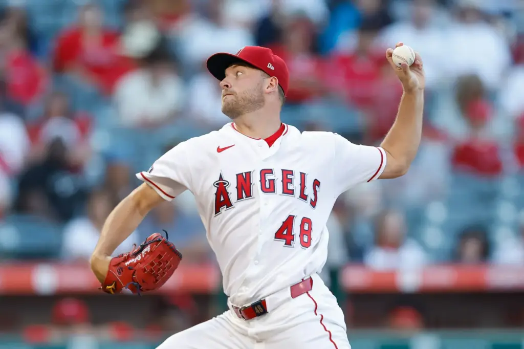 Angels starting pitcher Reid Detmers (48) throws during the second...
