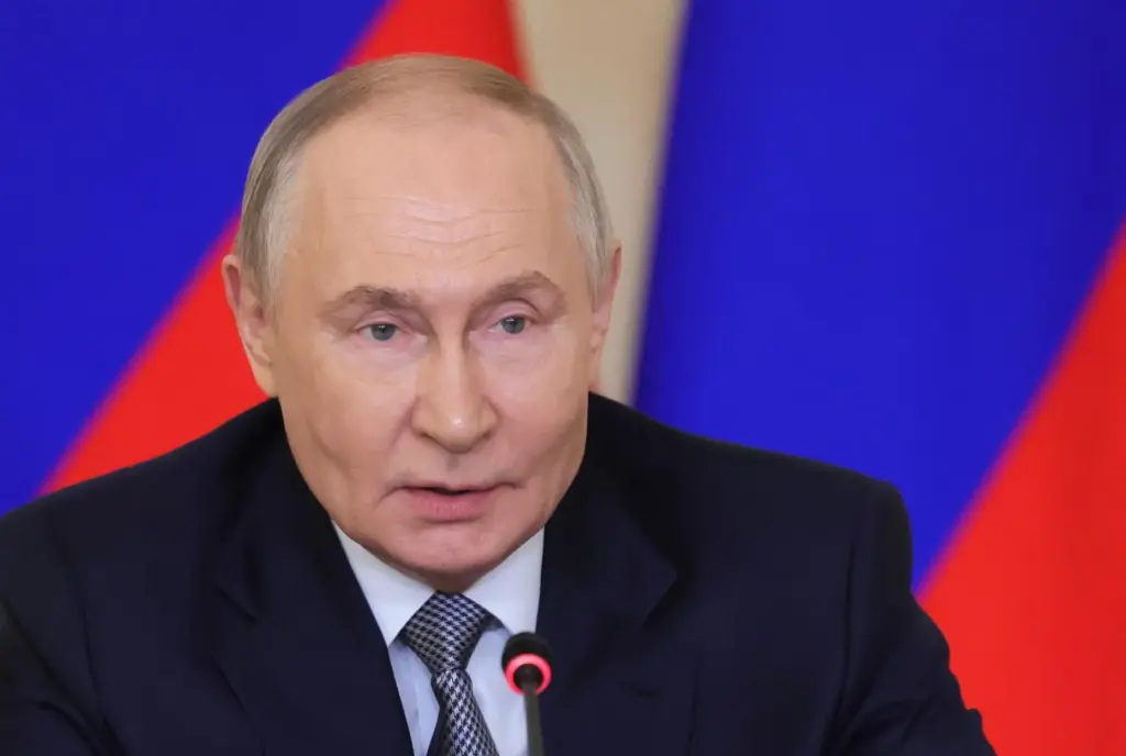 Russian President Vladimir Putin chairs a meeting.