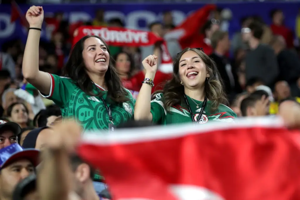 Fans from different nationalities watch a FIFA World Cup match...