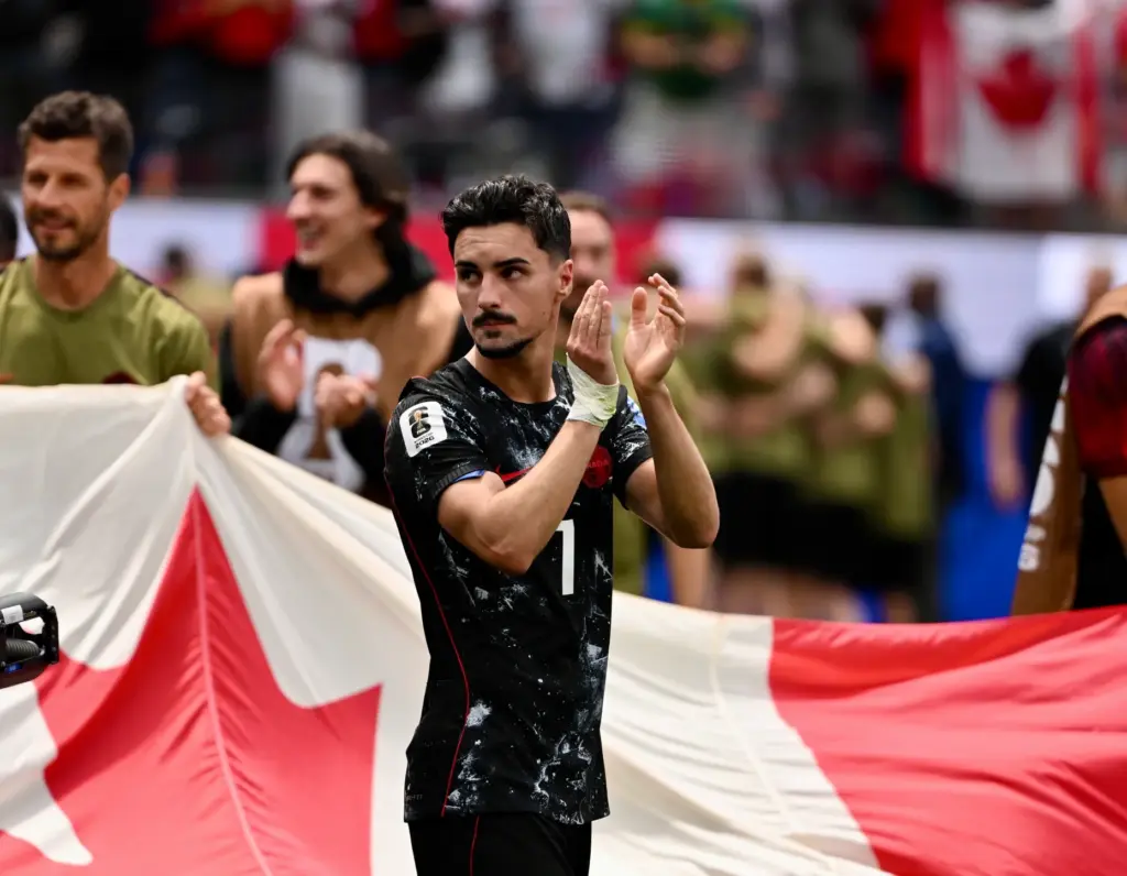 Canada midfielder Stephen Eustaquio (7) celebrates toward the fans after...