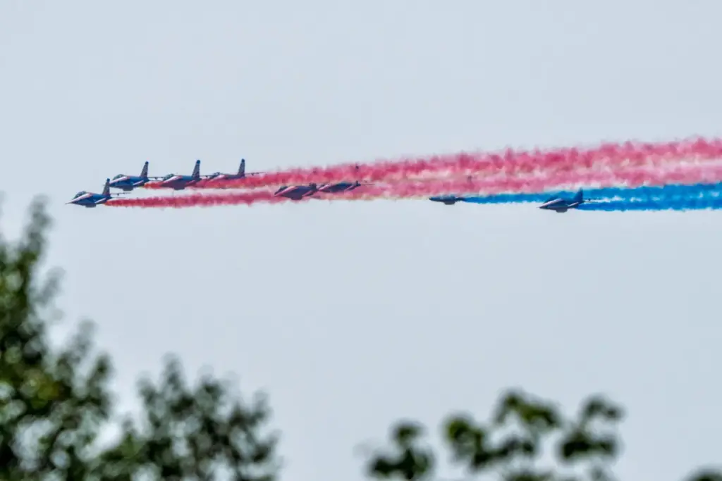 France's military aerobatic team, the Patrouille de France, flys over Washington.