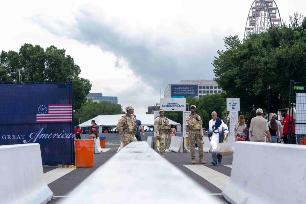 National Guard members stand at the entrance of the Great...