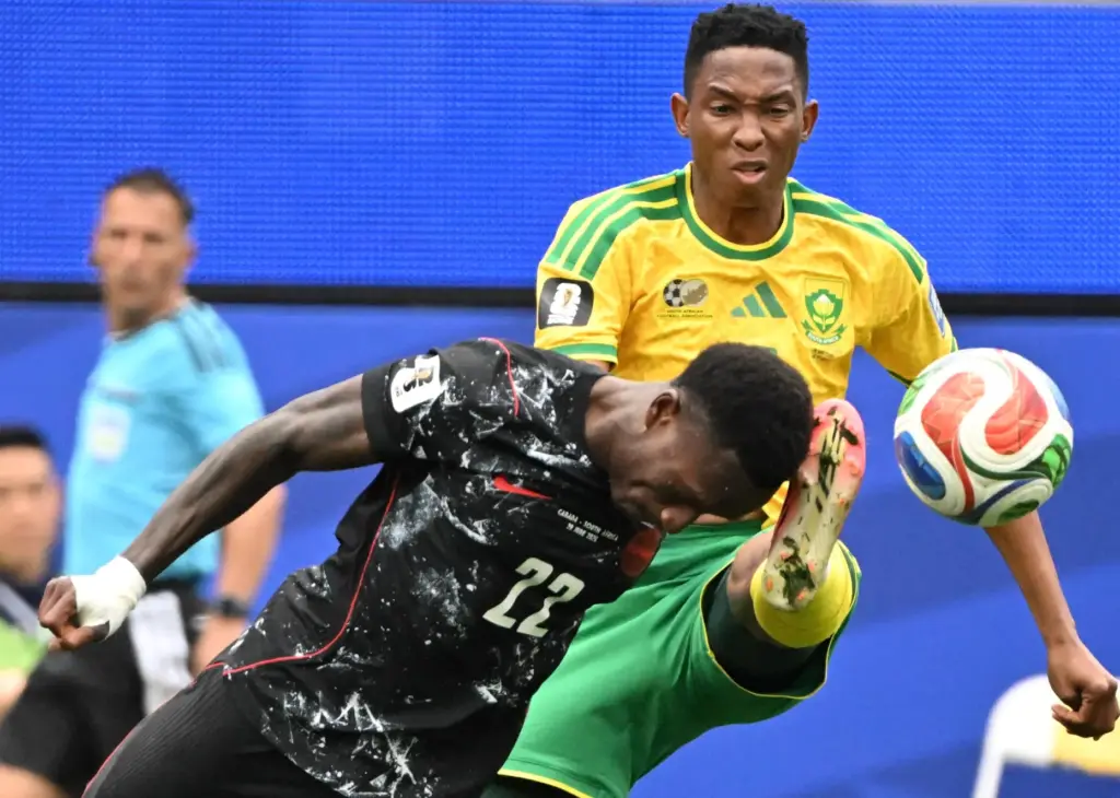 Canada defender Richie Laryea (22) is kicked in the head...