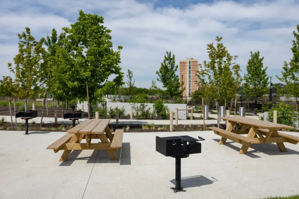Barbecue grills and tables are available for the public on...