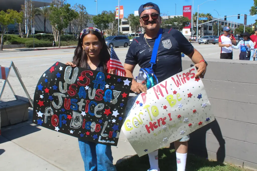 (L-R) Kamila and her father, Enrique Jimenez, from Hanford, brought...