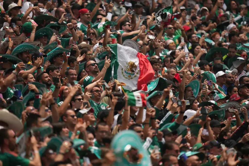 Mexican fans cheer before the World Cup Group A soccer...