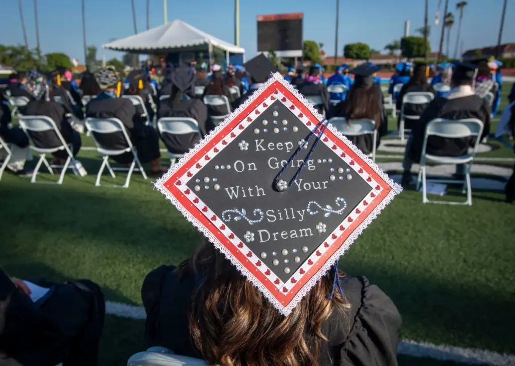 Some caps were covered with personal inspirational messages at Santiago...