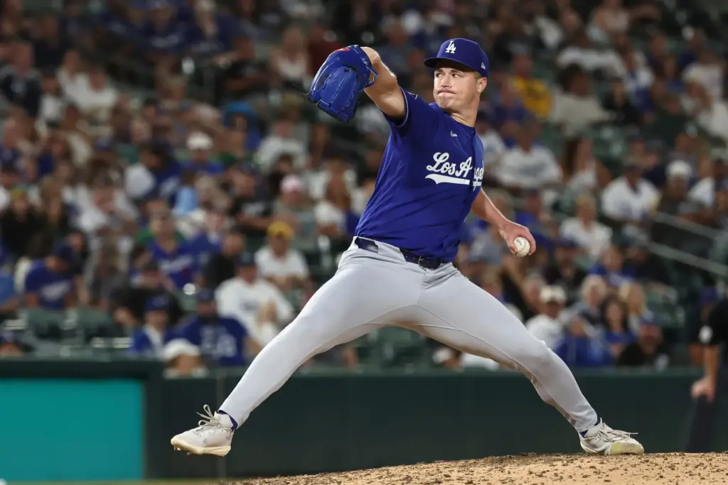 Dodgers relief pitcher Jack Dreyer throws to the plate during...