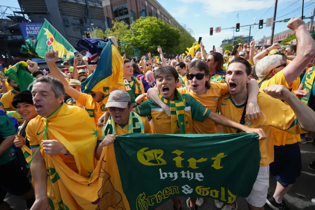 Australia fans march together to the stadium for the World...