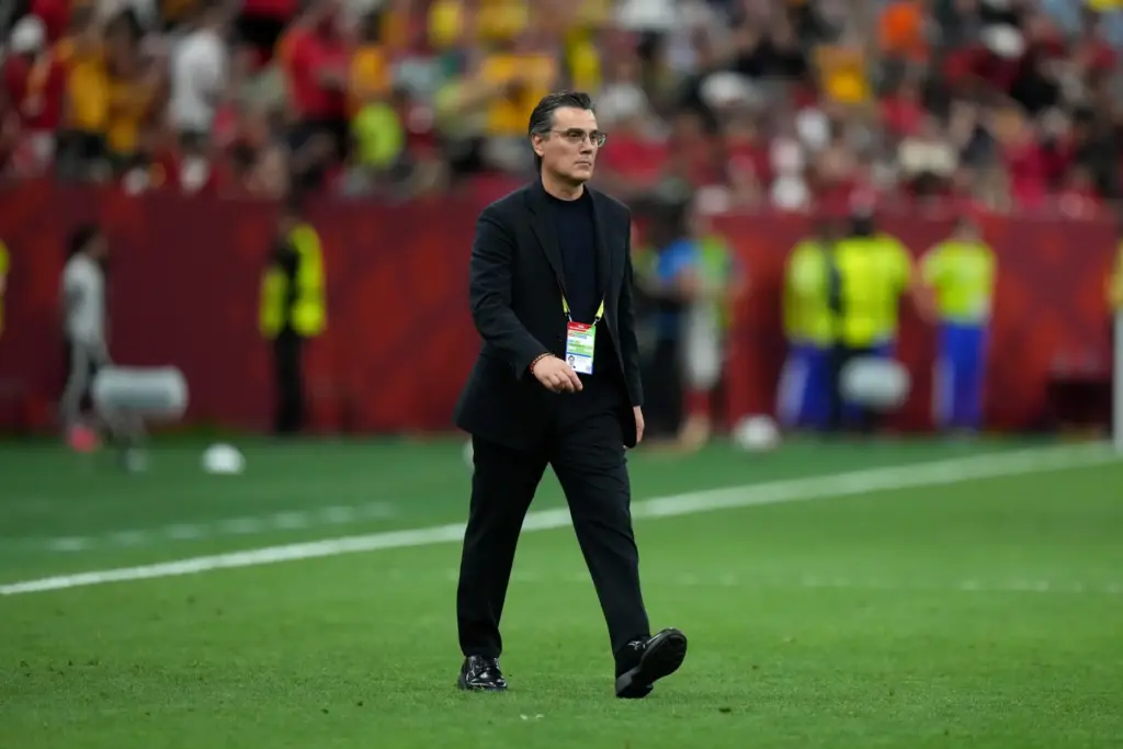 Turkey head coach Vincenzo Montella walks off the field at...