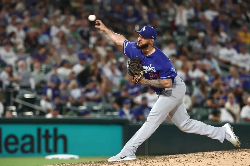 Dodgers relief pitcher Jonathan HernÃ¡ndez throws to the plate during...