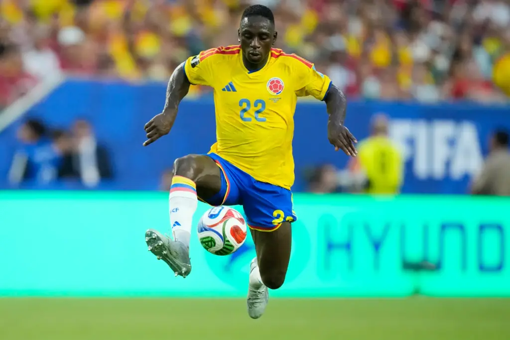 Colombia’s Deiver Machado (22) attempts to control the ball during...
