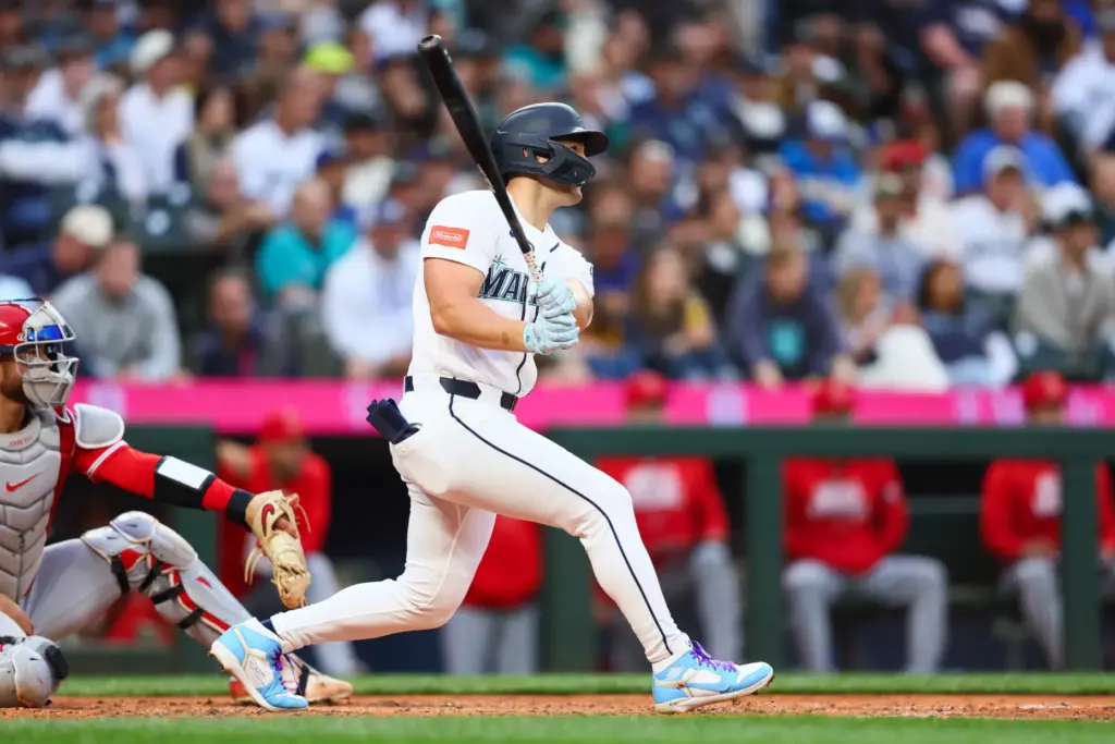 The Seattle Mariners’ Dominic Canzone hits a solo home run...