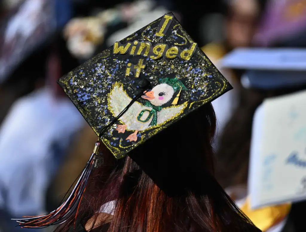 Huntington Beach High School graduates show their creativity by decorating...