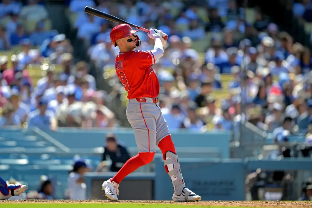 Angels’ Zach Neto watches his three-run home run during the...