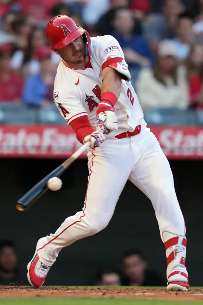 Angels star Mike Trout hits a single during the second...