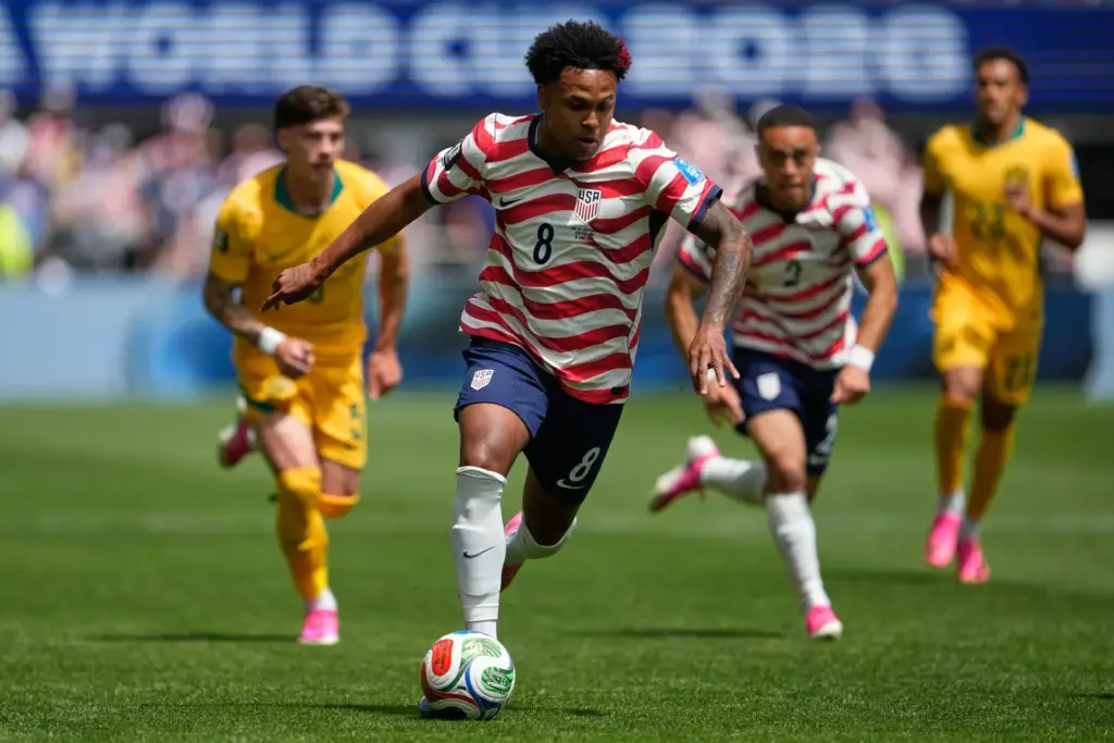 FILE – United States’ Weston McKennie (8) moves the ball...