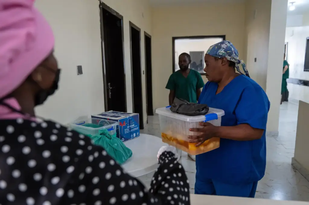 Arlette Basekawike prepares meals for Ebola patients.