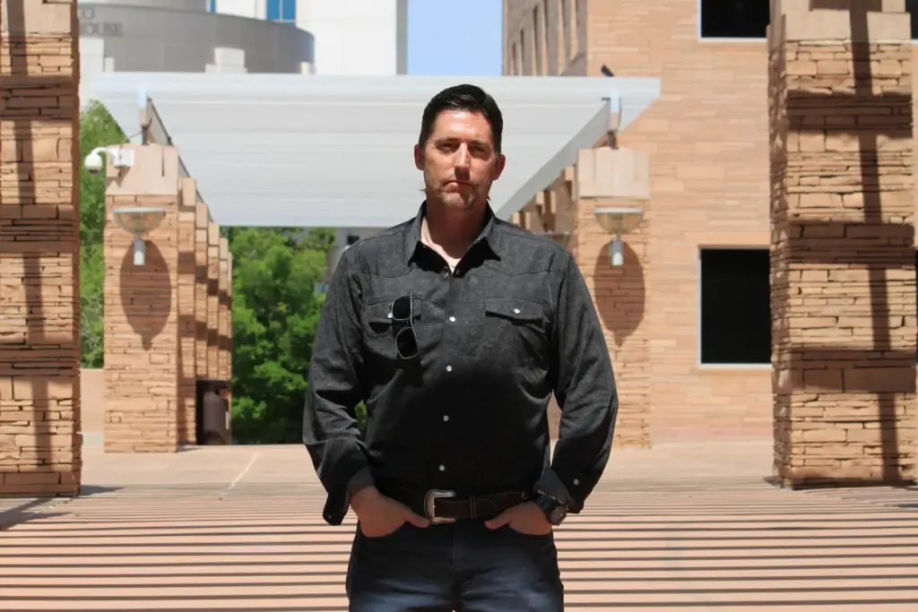 DEA Special Agent David Howell poses for a portrait outside the U.S. district courthouse in Albuquerque.