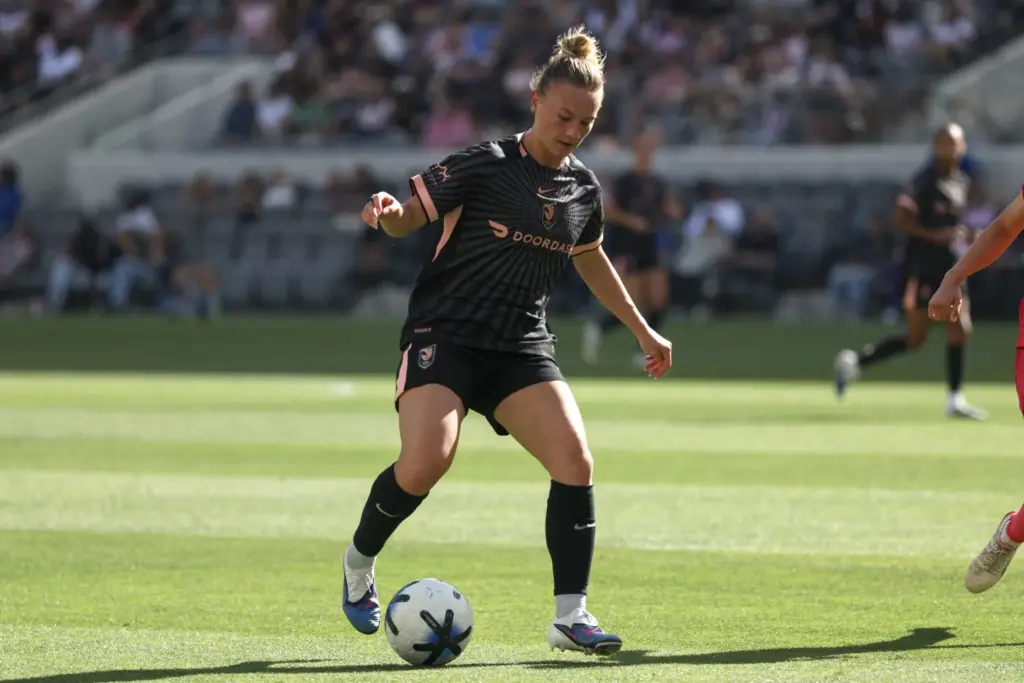 Angel City FC midfielder Kennedy Fuller controls the ball against...