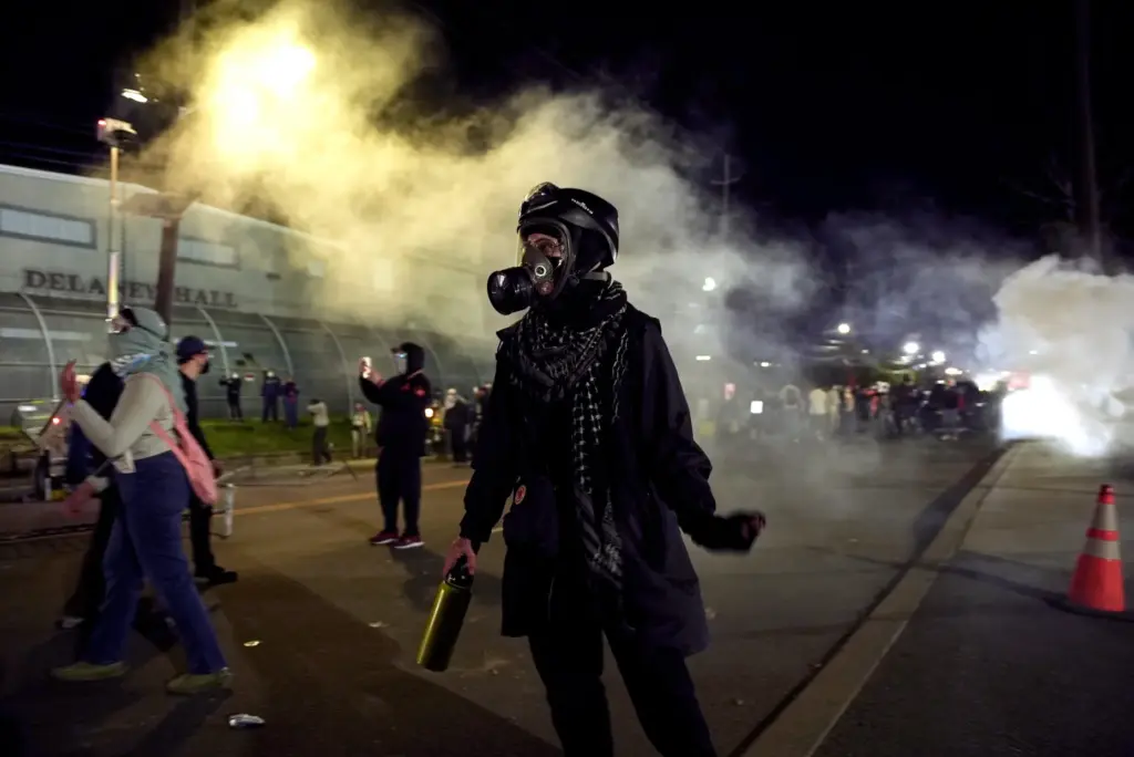 Anti-ICE protesters take to the streets during clashes with law enforcement.